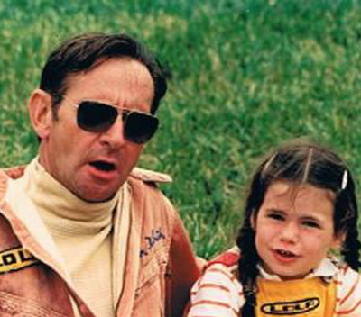 Chuck at the track with his daughter. [Dietrich family image]